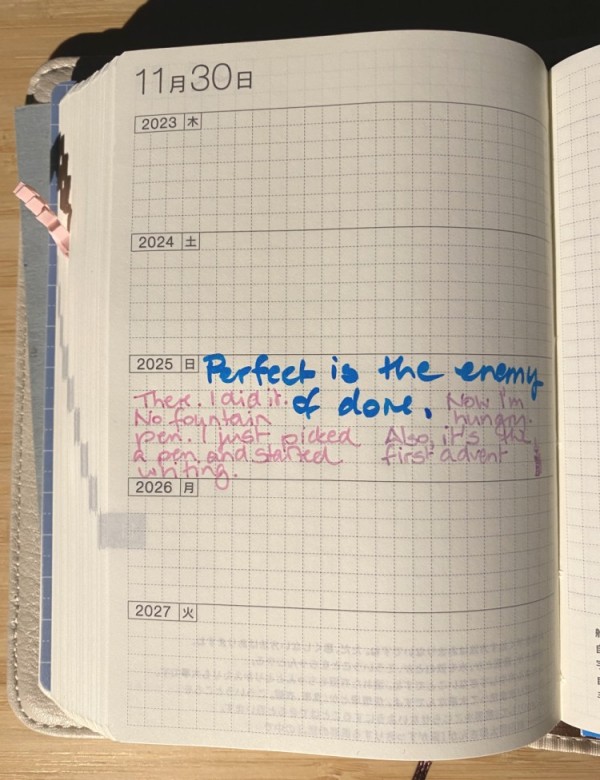 an open journal, the only entry reads: Perfect is the enemy of done. There I did it. No fountain pen. I just picked a pen and started writing. Now I'm hungry. Also, it's the frist advent.