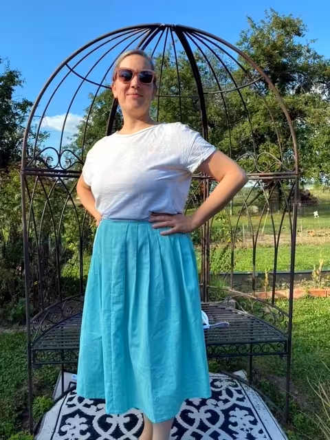 woman wearing a skirt and t-shirt